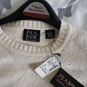 Never worn cream colored sweater